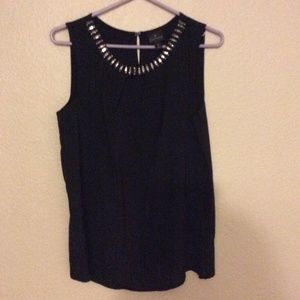 Black blouse with rhinestones on neckline